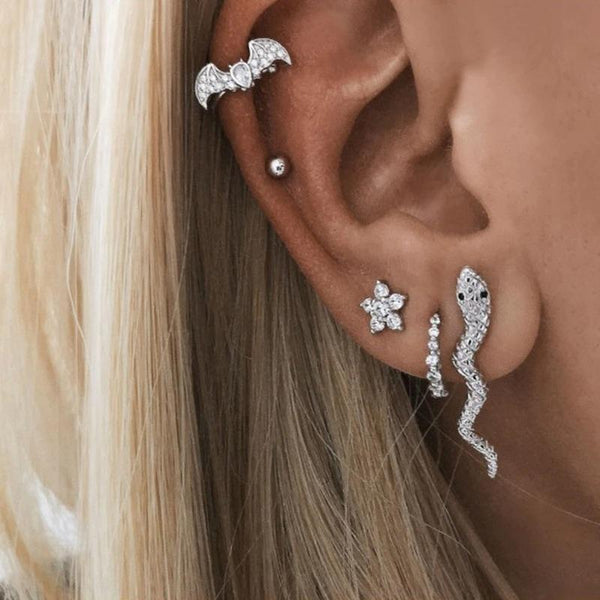 Boucles d'oreilles nœud celtique argentées - Blog Médiéval Boucles d'oreilles nœud celtique argentées - Blog Médiéval
